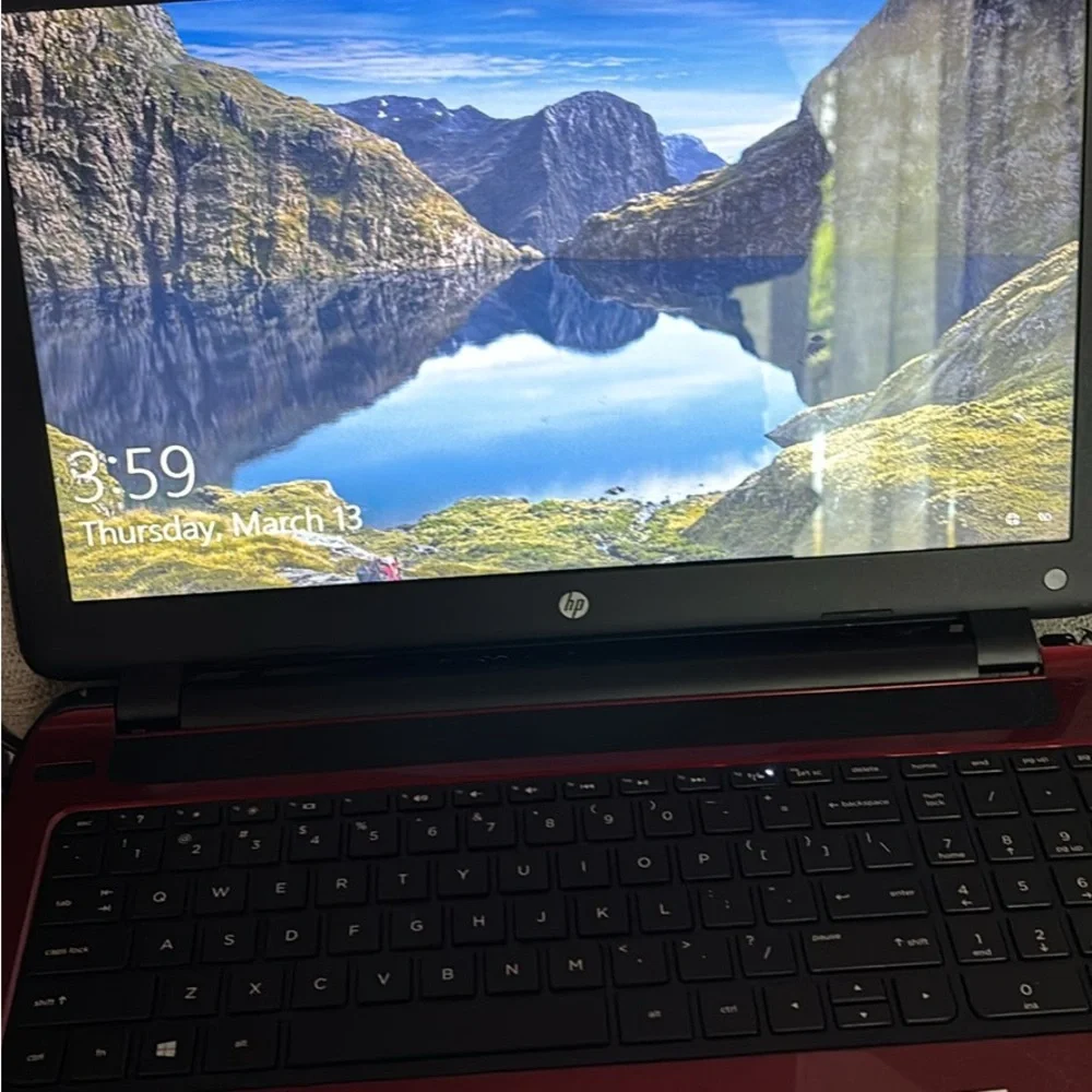 HP Red and Black Laptop with Full Keyboard and Modern Design